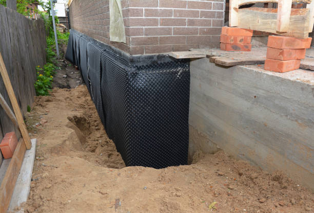 Happy homeowners after waterproofing job in Beersheba Springs